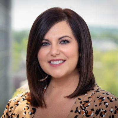 A woman smiling for a portrait